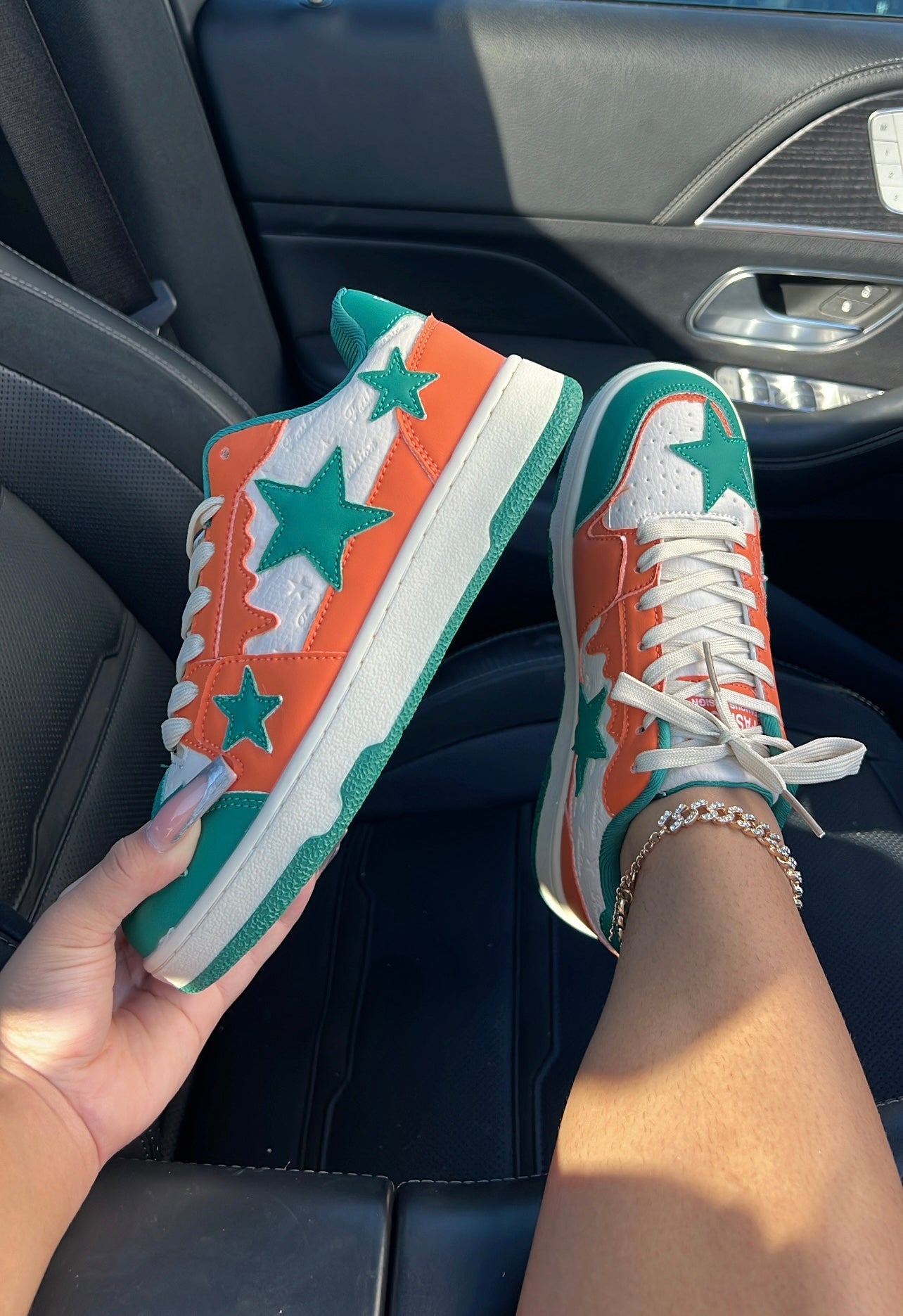 green & orange sneakers