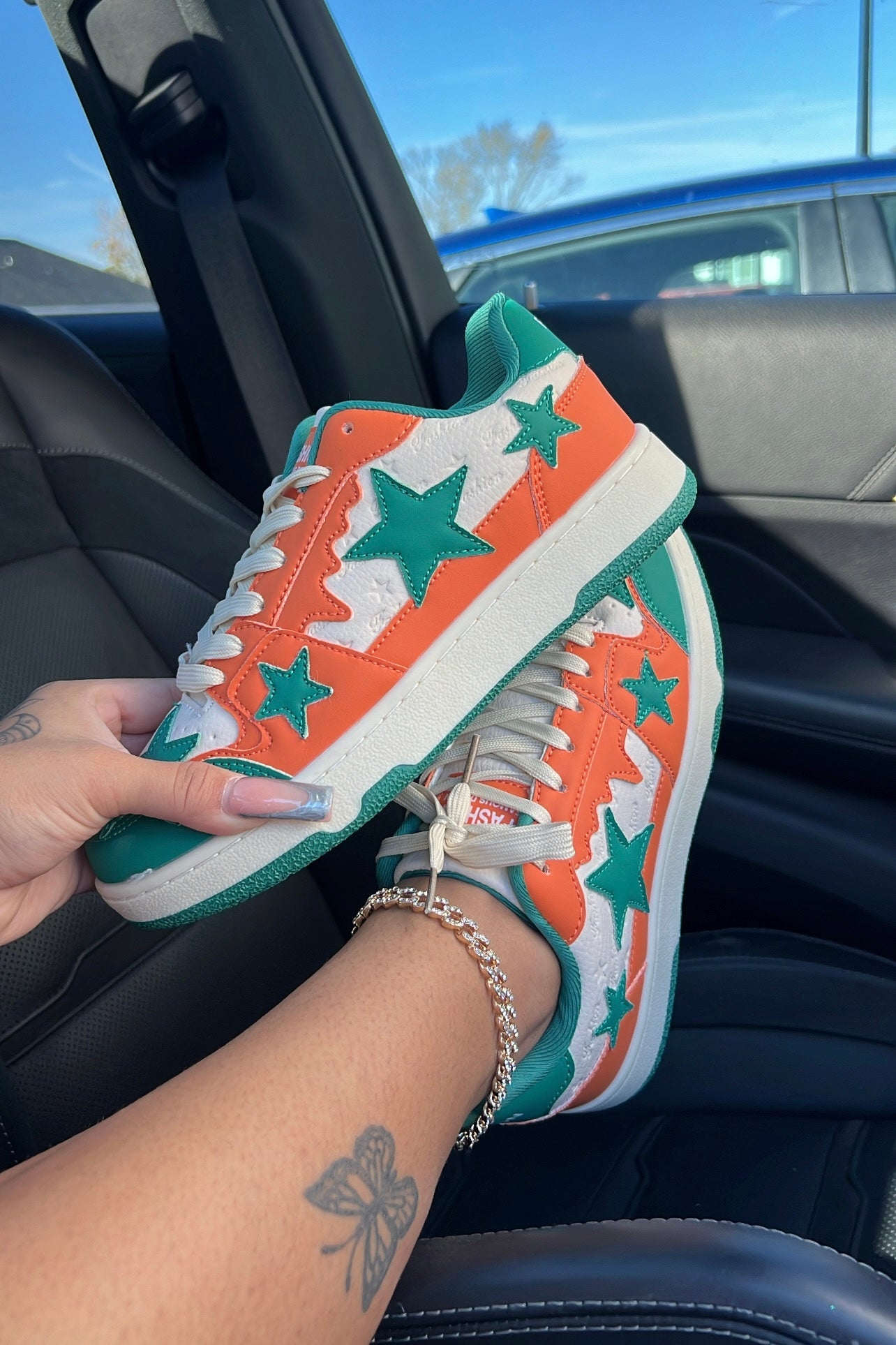 green & orange sneakers